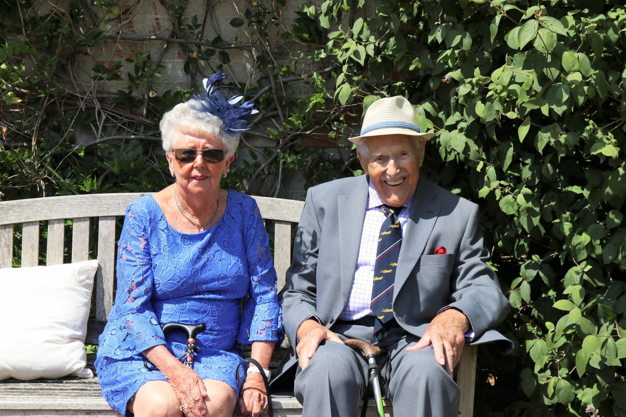 woman sitting beside man on wooden bench 1243332 1024x683 1 scaled